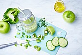 Green smoothie with apple, kiwi, pepper and cucumber