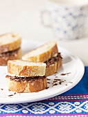 Mini sandwiches with baguette bread, butter and chocolate chips