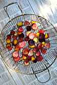 Beetroot chips in a deep-frying basket