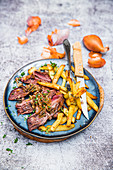 Shallot flank steak and French fries
