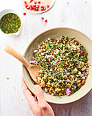Bulgur wheat with a herb sauce, onions and almonds