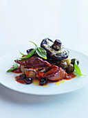 Chicken escalope with olives, tomatoes and pickled mushrooms