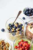 Triple overnight oats with fruits, nuts and chocolate