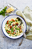 Risotto with sausages and peas