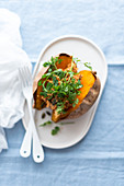 Baked sweet potato with shredded chicken
