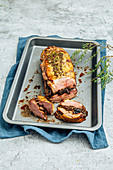Duck magret roast with prune,shallot and thyme stuffing
