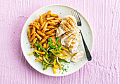 Chicken breast with paprika penne and peppers