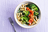 Penne with smoked salmon, creamed spinach and broccoli