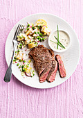 Beef steak with potato, radish and pea salad