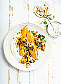 Grilled sweet potato with chickpeas and yogurt sauce