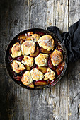 Cobbler with plums and vanilla ice cream