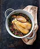 Guinea-fowl with chestnuts and peas