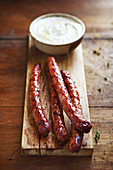 Grilled sausage with dried white bean puree