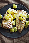 Pollock fillets with white grapes