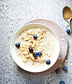 Coconut milk porridge with vanilla and blueberries