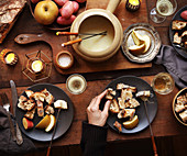 Table with apple and potato fondue