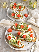 Cream cheese,cucumber and watermelon on toasts