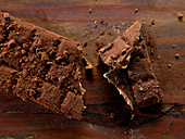 Chocolate bar sprinkled with hazelnuts
