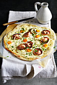 Thick cream,Aandouille de Guémené,quail's egg and Roscoff onion pizza