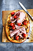 Tapenade,mortadelle,pistachio and cherry tomato pizza
