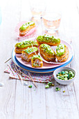 Salted éclairs as an aperitif with salmon and wasabi