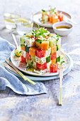 Multicolored aperitif cube of vegetables and feta cheese