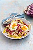 Salad of leek, red cabbage and soft-boiled egg