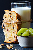 Well-balanced teatime :chocolate chip brioche,kiwi and a glass of milk