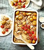 Cajun chicken breast, roasted potatoes, and cherry tomatoes