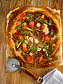 Pizza with manchego cheese, asparagus, salty fingers