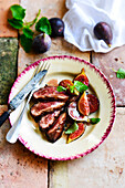 Duck breast with figs, honey and lemon balm