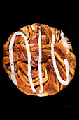 Cinnamon bun with sugar icing