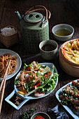Asian food served with shrimp salad