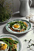 Fried egg and wild asparagus on potato pancake