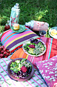 Avocado salad with beetroot hummus, red cabbage and bulgur for a picnic