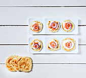 Small blinis with smoked salmon and sour cream