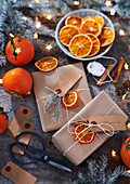 Christmas gifts with decorative, dried orange slices