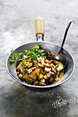 Aubergine and chickpea curry with grated coconut