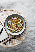 Chinese soup with noodles and mushrooms (Asia)