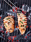 Pork escalopes with olives grilled on the barbecue