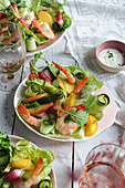 Prawn salad with peaches, zucchini and asparagus