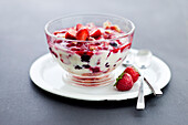 Berry dessert with cream and meringue