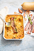Gratin of butternut squash with smoked bacon, chavignol and shallots