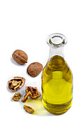 Vegetable walnut oil in a glass bottle