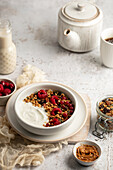 Granola muesli with yogurt and fresh raspberries