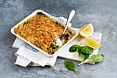 Fish and spinach pie with lemon