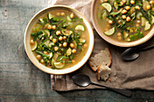 Green broth with cabbage, zucchini and chickpeas