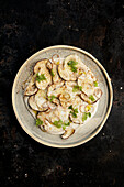 Pork tenderloin with almond and mushroom cream