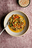 Vegetable noodles with cheese sauce