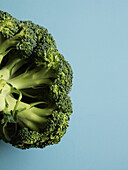 Broccoli against a green background
